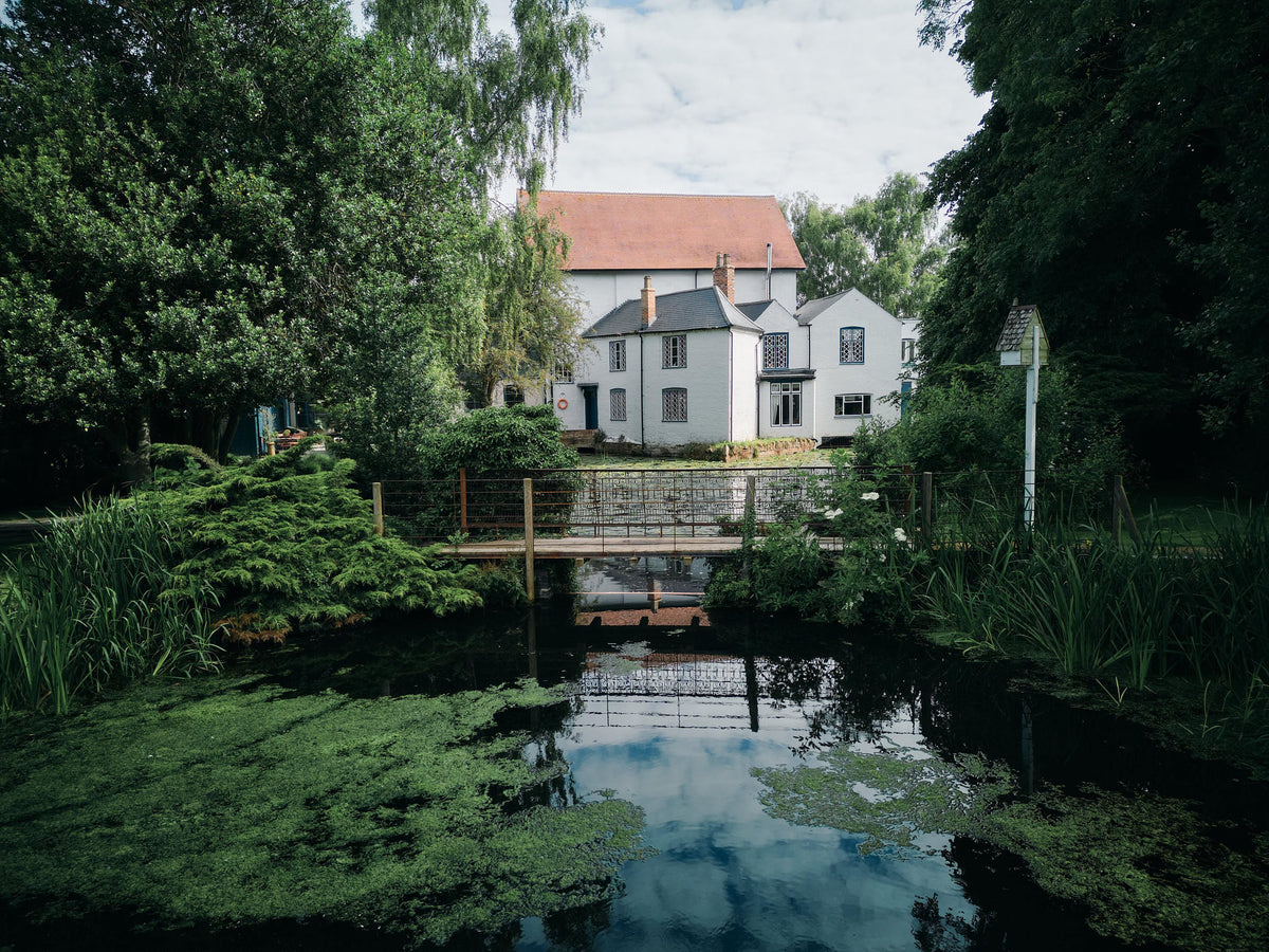 The home of Nacoco kitchens in Leicestershire sits beside the Cotes pond and lush green British countryside.